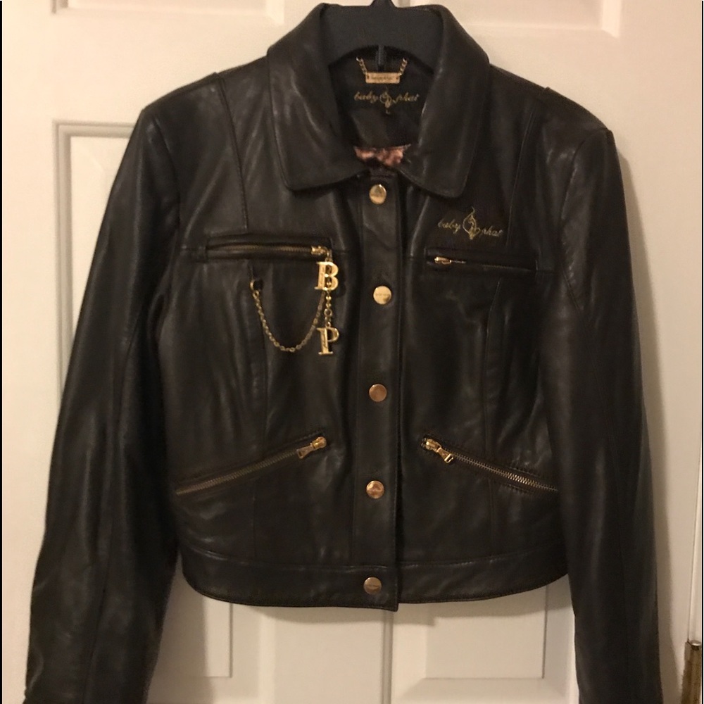 Woman’s leather jacket by Baby Phat .